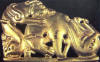Золотая бляха с изображением борьбы фантастического хищника с лошадью. Из сибирских курганов, коллекция Кунсткамеры. Скифское время